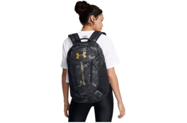 Image of Under Armour Ua Hustle 6.0 Backpack, Black/black/metallic Gold - 1384672001OSFM